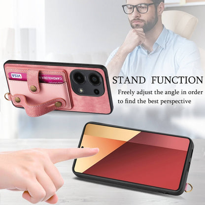 Pink leather wallet phone case with wrist strap, card slots, and stand support