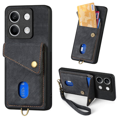 Leather wallet-style phone case with card slot and wrist strap, black with snap closure.