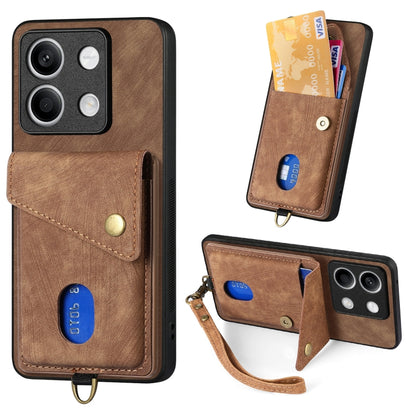 Leather wallet-style phone case with card slot and wrist strap, brown with snap closure.