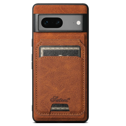 Brown leather phone case with detachable card wallet slot, litchi texture, camera cutout.