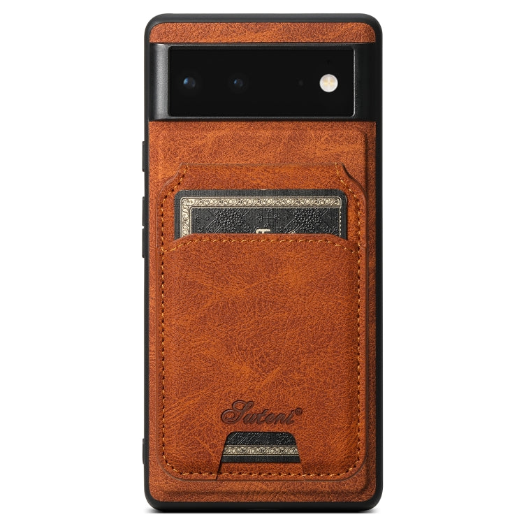 Orange-brown leather phone case with detachable wallet card slot, litchi texture, camera cutout.