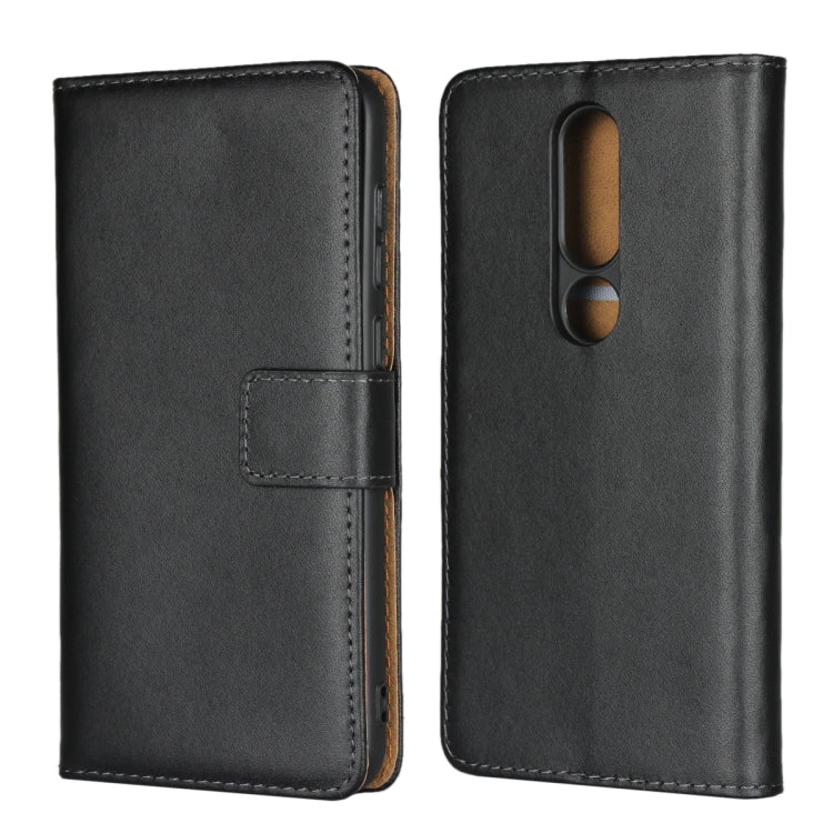 Black leather flip phone holster wallet with camera and speaker cutouts.