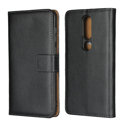 Black leather flip phone holster wallet with camera and speaker cutouts.