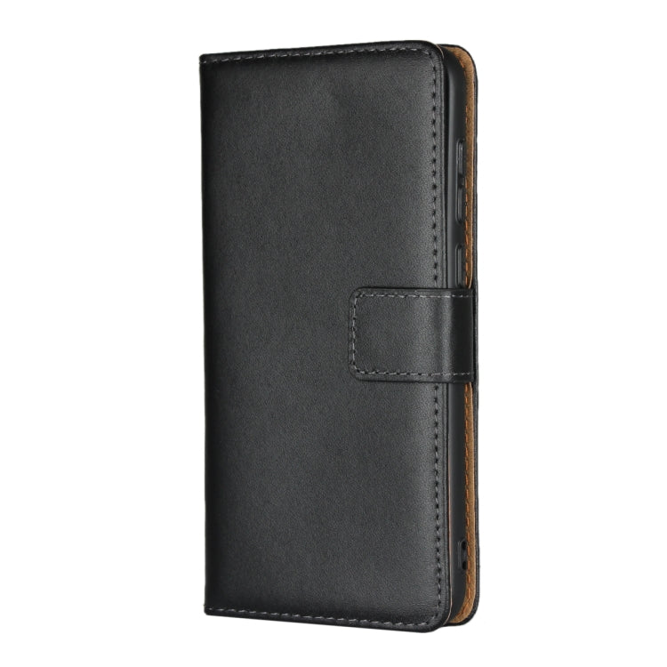 Black leather vertical flip holster wallet with magnetic clasp strap detail.
