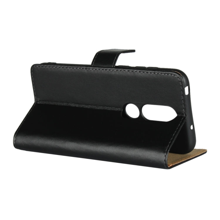 Black leather folio flip cover with phone inside and dual cutouts visible.