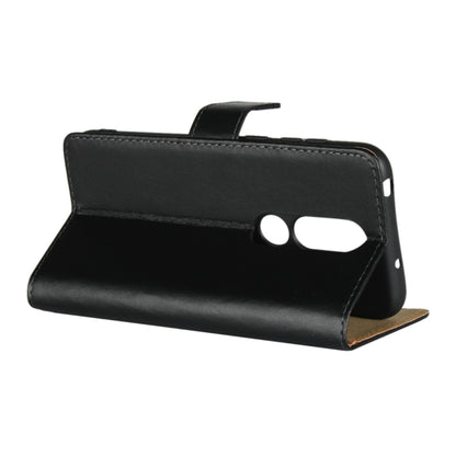 Black leather folio flip cover with phone inside and dual cutouts visible.