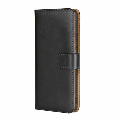 Black leather flip phone holster with front magnetic closure strap and stitched edges