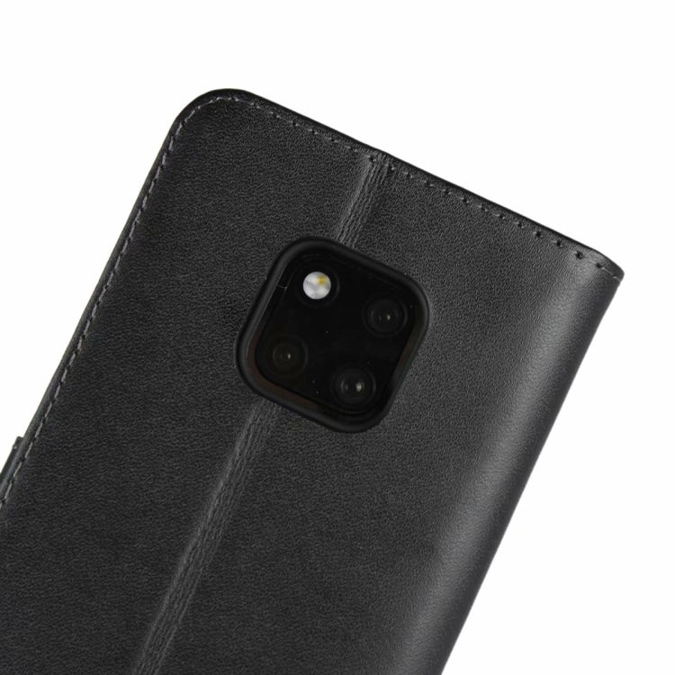 Black leather holster back with camera lens cutout and textured surface detail