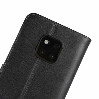 Black leather holster back with camera lens cutout and textured surface detail