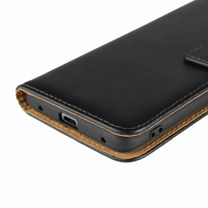 Black leather holster bottom edge with speaker/mic cutouts and tan stitching trim