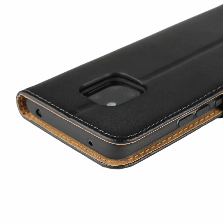 Black leather holster bottom view with charging port opening and speaker cutout