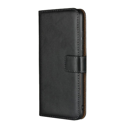 Black leather flip phone wallet holster with front closure strap and stitching