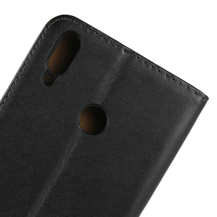 Black leather phone wallet case with camera cutouts and textured stitched surface