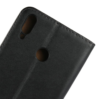 Black leather phone wallet case with camera cutouts and textured stitched surface