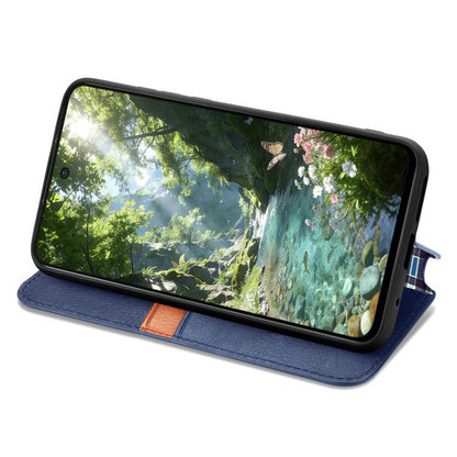 Blue leather magnetic phone case folded as a stand for viewing
