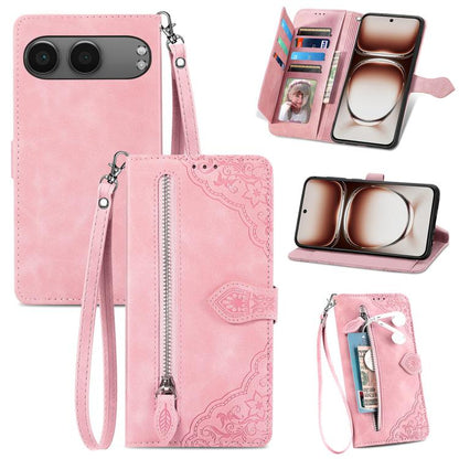 Pink embossed flower zipper leather phone case with wrist strap and card slot