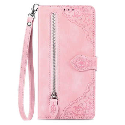 Pink leather wallet phone case with embossed floral design and long center zipper