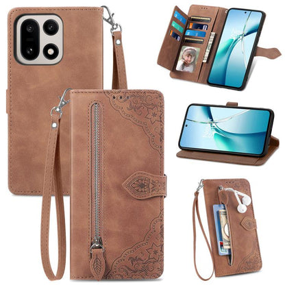 Brown embossed flower zipper leather phone case with wrist strap and card slots