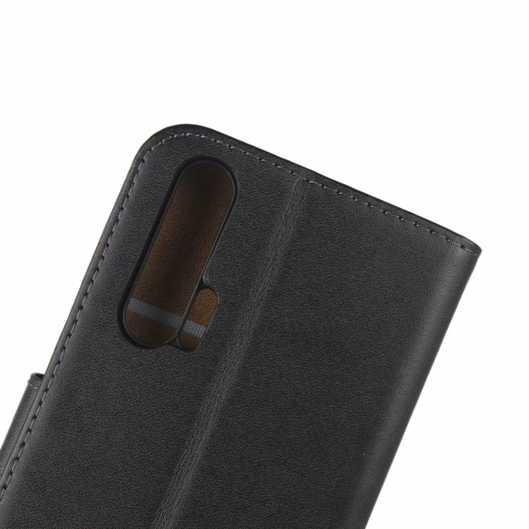 Close-up: black leather phone holder with camera cutout and molded insert