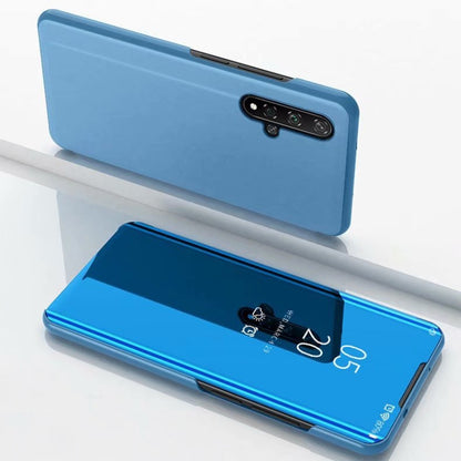 Blue mirror flip leather case with holder, closed back and open front view.