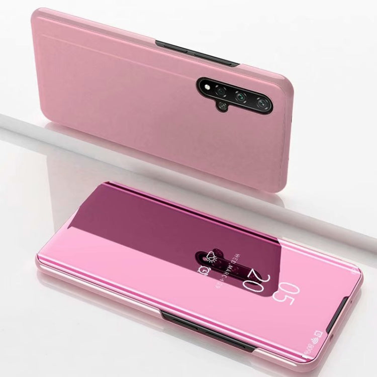 Pink flip leather phone case with horizontal mirror window and camera cutouts