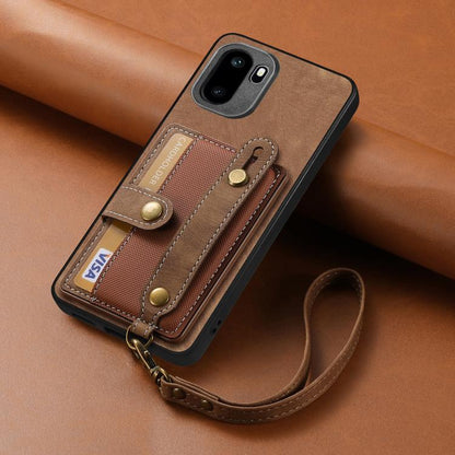 Brown leather phone case with card pocket and attached wrist strap, close-up