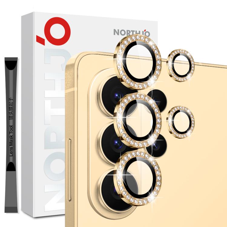 Diamond metal camera lens protector ring film for a gold phone with spare ring pieces.