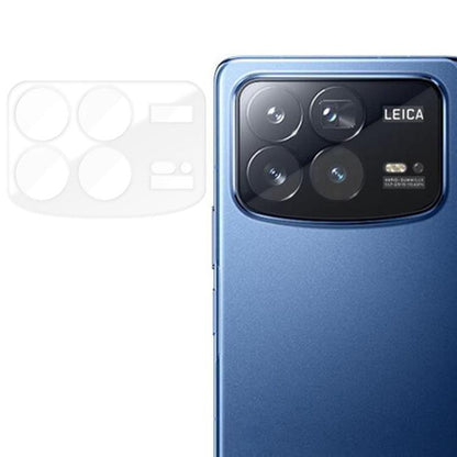 Transparent tempered glass camera lens film with anti-fingerprint cutouts for quad lenses