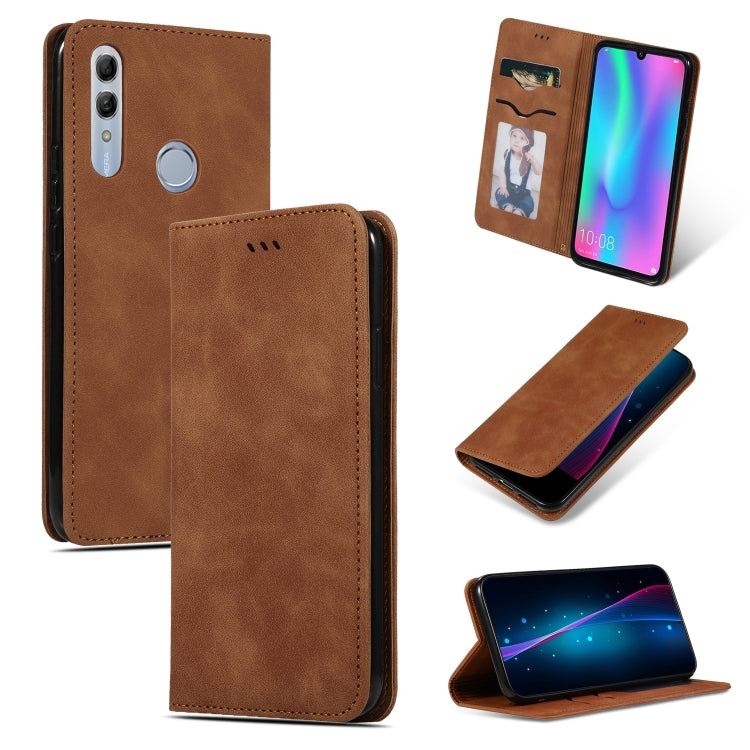 Brown magnetic horizontal flip leather phone case with stitched edges and camera cutout