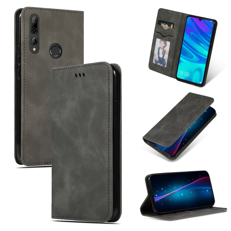 Dark gray magnetic flip wallet phone case with card window and camera cutouts.