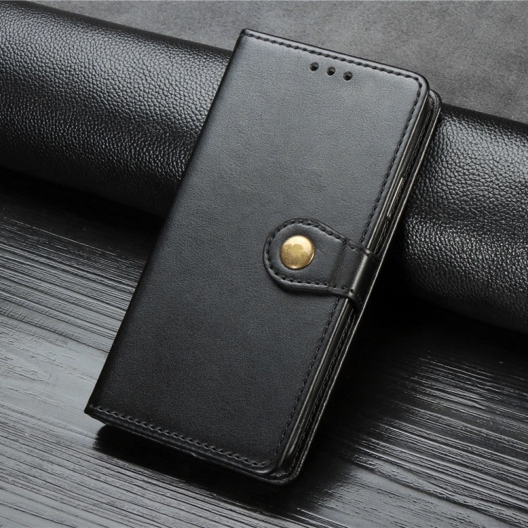 Black leather flip phone case with snap closure and card slot, close-up view