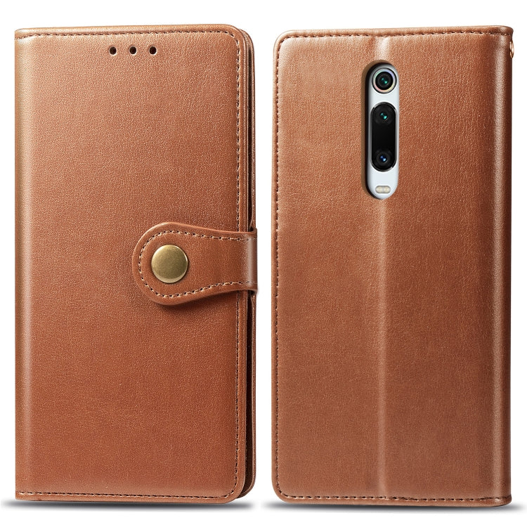 Brown leather wallet phone case with front flap and round snap button
