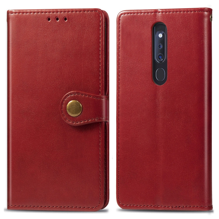 Red leather wallet phone case with magnetic flap and camera cutout