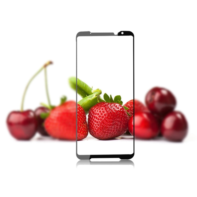 Tempered glass screen protector on phone display, clear protective glass