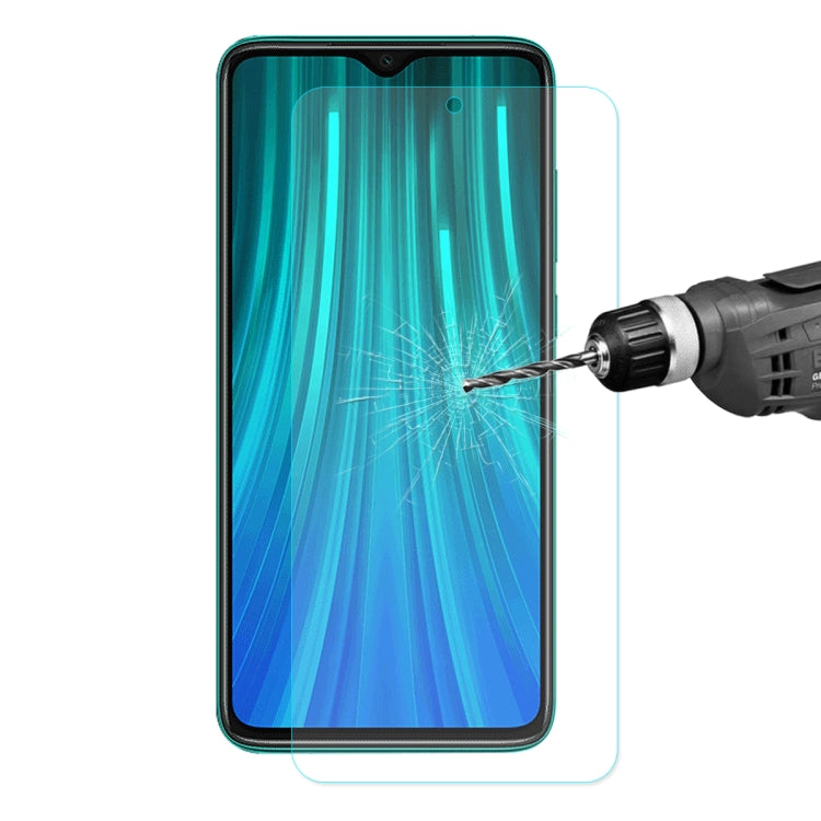 ENKAY tempered glass screen protector film shown on phone with tool aiming at glass