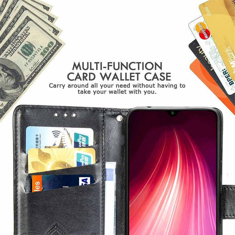 Black multi-card wallet flip case with embossed butterfly flower design, phone and cards visible