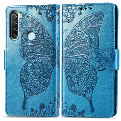 Blue embossed butterfly flip wallet phone case with magnetic strap on folio cover