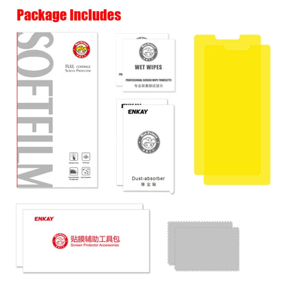 Screen protector package contents with cleaning wipes, cloth, and accessories