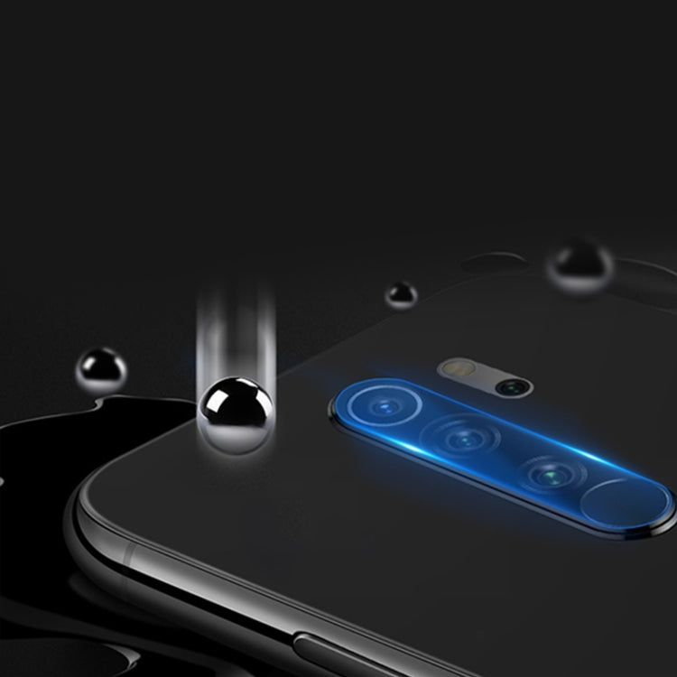 Tempered glass rear camera lens protector with blue overlay on black phone