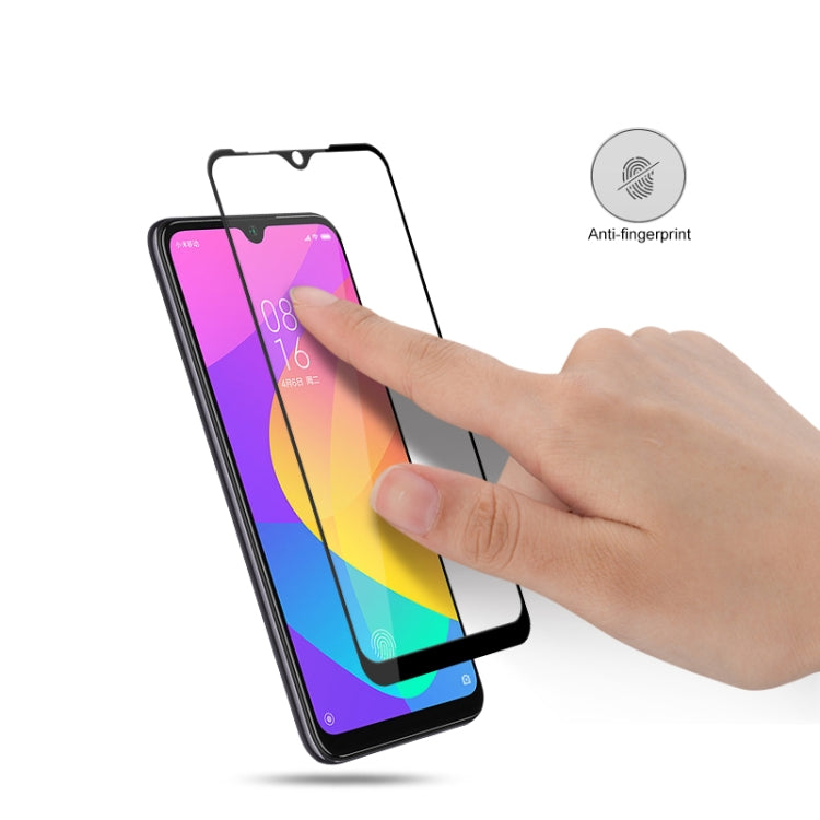 Tempered glass screen protector (2-pack) being applied by hand with anti-fingerprint icon
