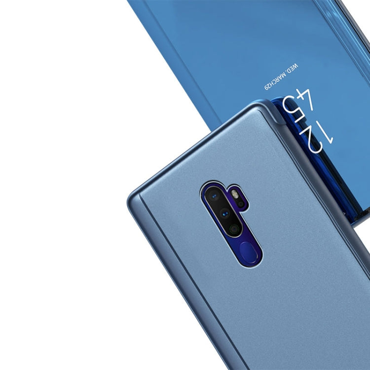 Blue flip phone case with camera cutout, rear finish and stand hinge detail