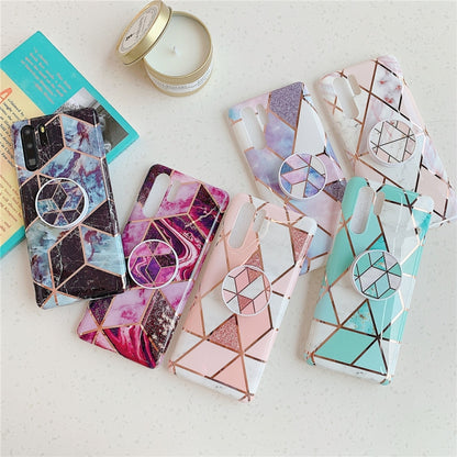 Set of geometric mosaic phone cases with circular ring holders and folding brackets