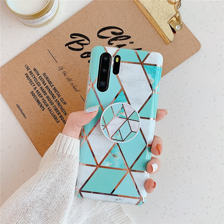 Teal geometric phone case with circular ring holder and folding bracket