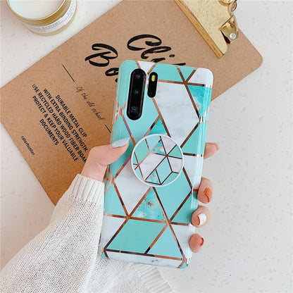 Teal geometric phone case with circular ring holder and folding bracket