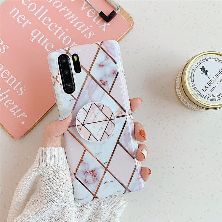 White geometric marble phone case with circular ring holder and camera cutouts
