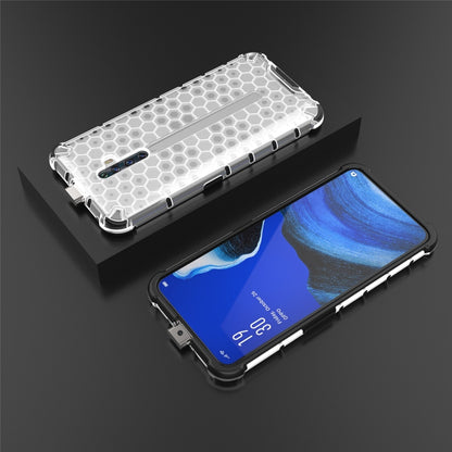 Clear honeycomb shockproof phone case with phone front and back, angled view