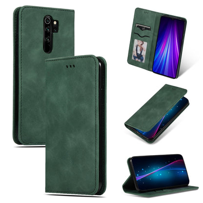 Army green magnetic flip leather phone case with card slot and camera cutout; stand view