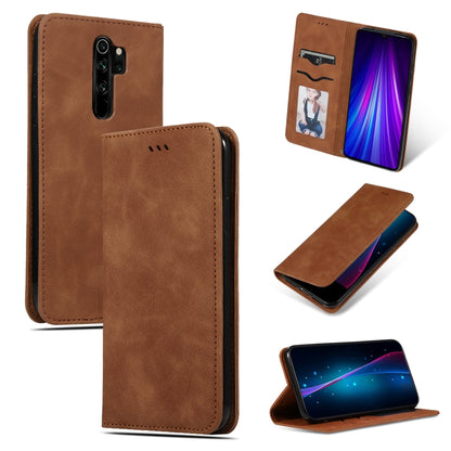 Brown magnetic flip leather phone case with card slot, camera cutout, and viewing stand