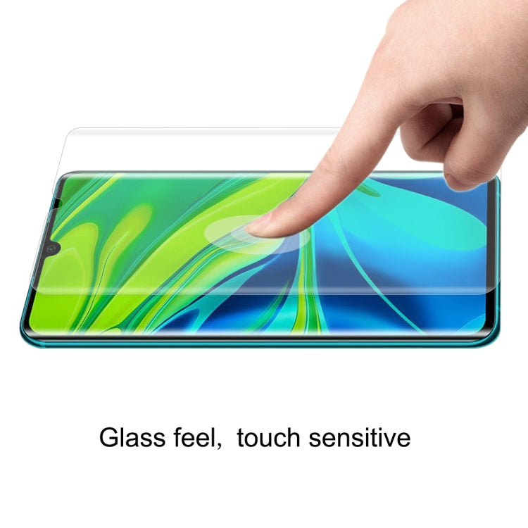 Clear hydrogel full-screen protector film on phone with finger touch