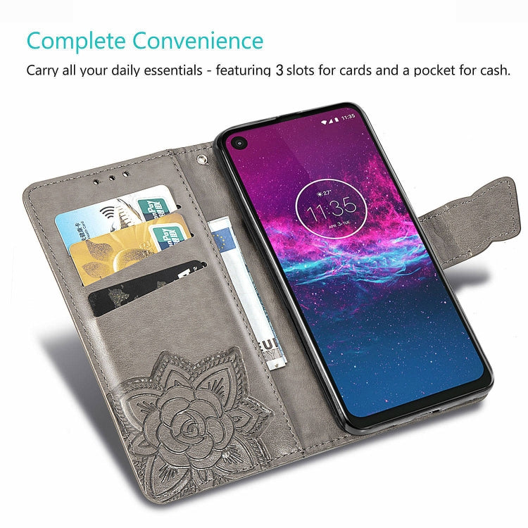 Gray embossed flip wallet case with card slots and cash pocket; phone shown inside